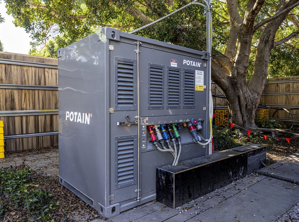 A Potain battery power unit installed on site at Portside, Hamilton